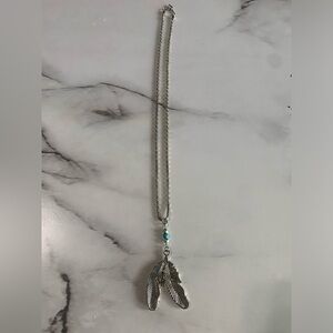 Silver Colored Feather Pendant Necklace